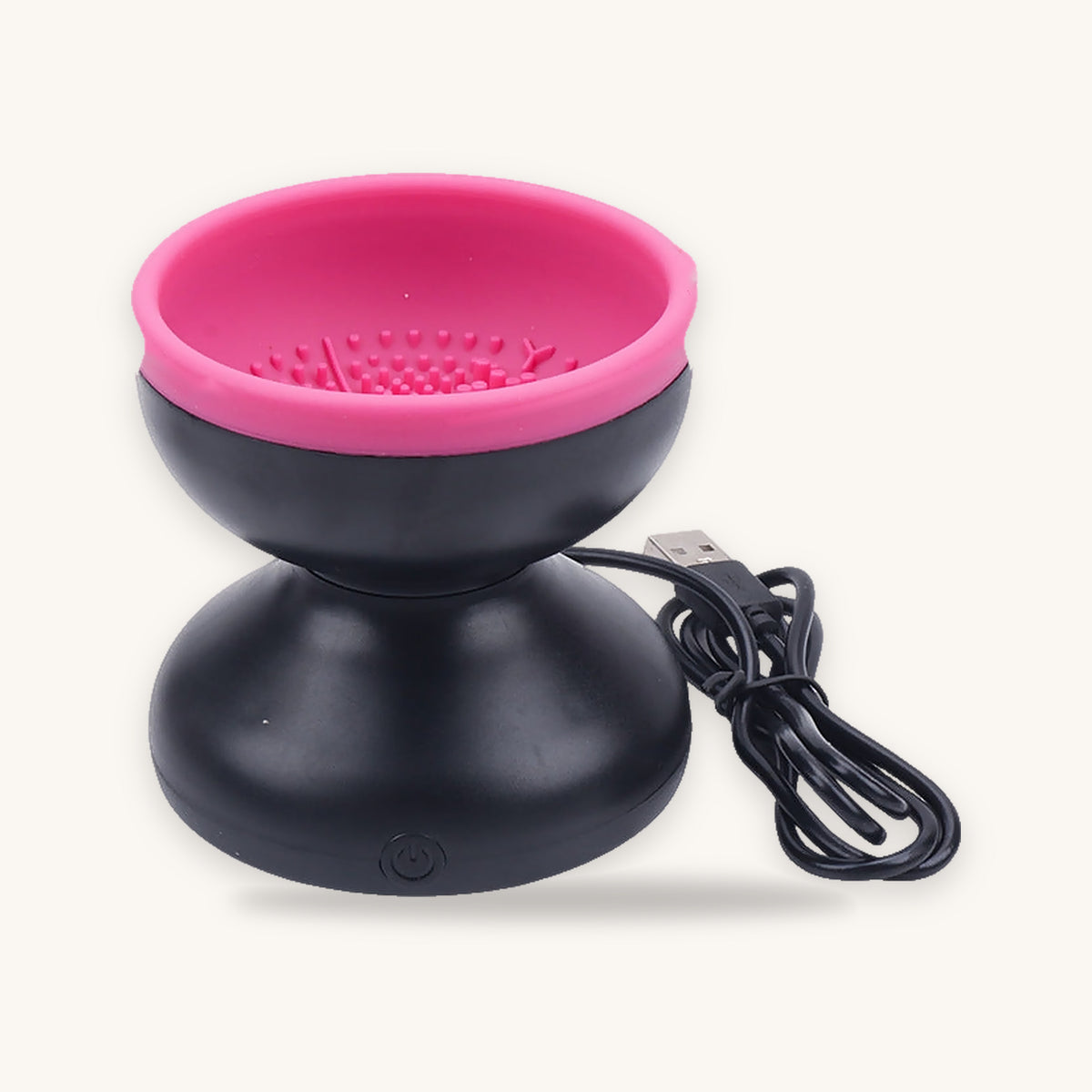 Pink and black electric makeup brush cleaner with USB cord, center mold